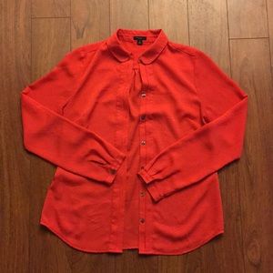 Bright red/orange blouse